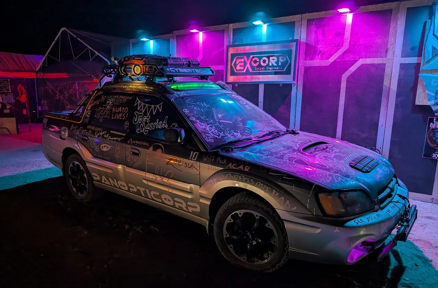 The Panopticorp art car lit up at Neotropolis