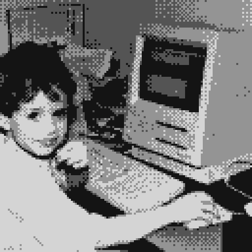 A pixelated black-and-white photo of me as a child at an early computer